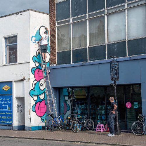 NOL Nolart streetart graffiti mural character design happy Penge London
