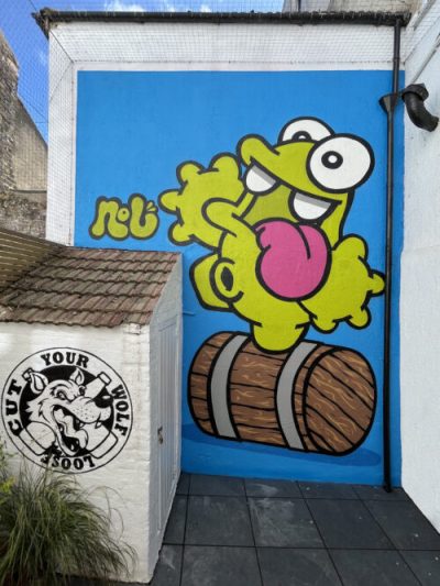 NOL Nolart streetart graffiti mural character design happy CutYourWolfLoose Brighton Nolart Nol Whiskey